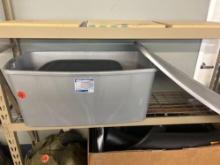 large grey 50 gallon tote and smaller black tote