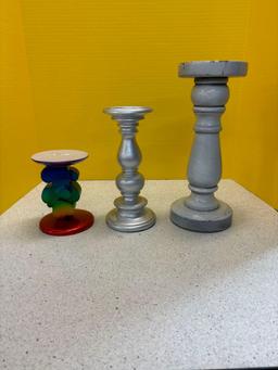 Three candleholders, one new with tags