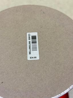 Three candleholders, one new with tags