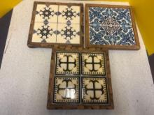 3 wooden framed vintage ceramic trivets