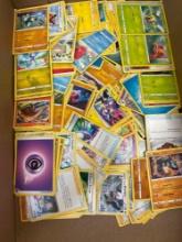 about 300 Pokemon cards