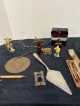 Camera, silver plate, fountain, pens, etc.