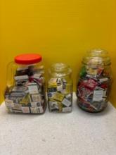 Collectible matches, two large glass canisters
