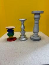 Three candleholders, one new with tags