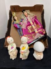 Porcelain Oriental dolls