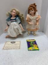 2 porcelain dolls and a go fish card game