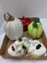 Hand blown glass pumpkins and ceramic masks