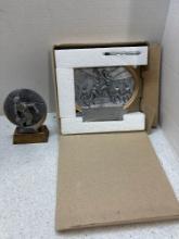 Box of unengraved basketball trophies