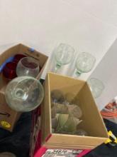 various taller and shorter wine glasses/ globe vases
