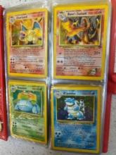 vintage Pokemon card collection. first edition, holographic Charizard and Blaines charizard