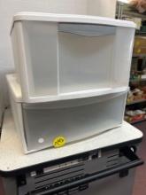 two plastic storage bins