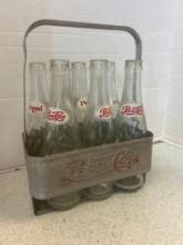 Old Pepsi metal bottle carrier with six Pepsi bottles