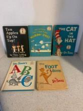 Five Dr. Seuss books see pictures for description