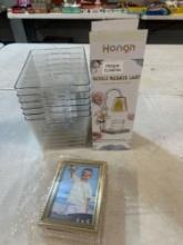 plastic refrigerator organizer bins, candle warmer lamp, and 4 x 6 frames