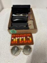 Glasses and sunglasses see description
