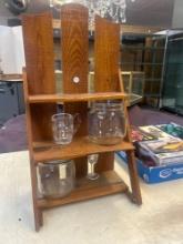 vintage wooden bottle shelf with crystal glass