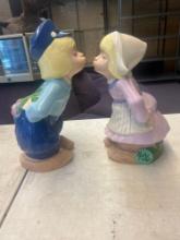ceramic kissing Dutch boy and girl statues