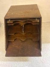 slant front wooden box with shelves