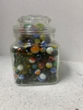 marble collection in glass jar