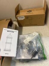 bathroom hanging shower organizer, weather station, handheld garment steamer and brown travel bag