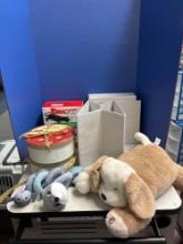 Miscellaneous lot includes storage containers, Christmas plate sets, Plush animal