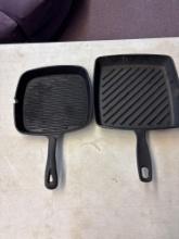 Two cast-iron skillets, HEUCK classics and Food Network