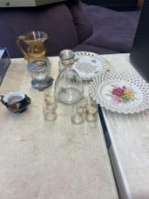 crackle glass pitcher vase, decorative plates, Carson metal stand