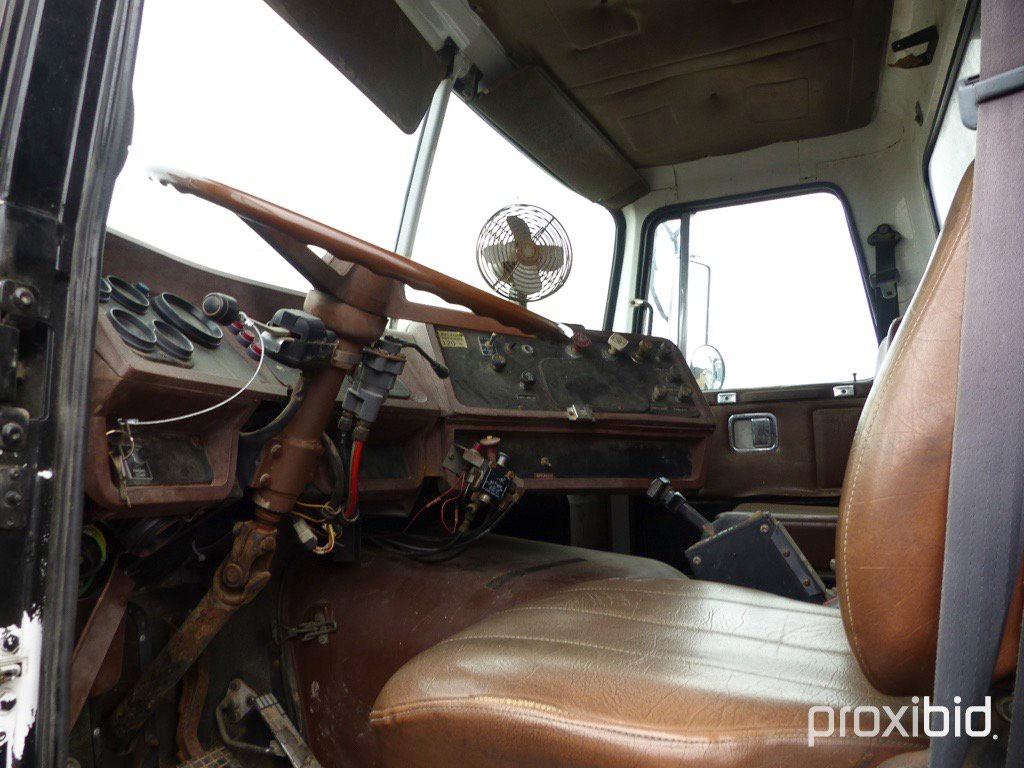 1991 WHGM WCS T/A DUMP TRUCK;