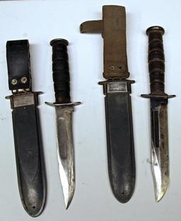 (2) WWII U.S.N. Mk 2 Military Knives in Sheath, B. M. Co. on Back of Sheath, Some Damage to One