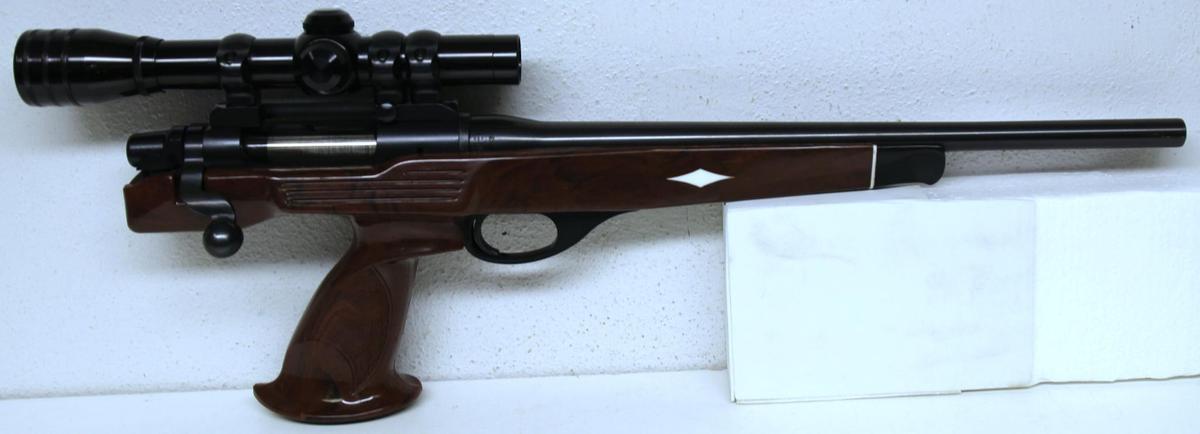 Remington Model XP-100 .223 Rem. Bolt Action Pistol w/Redfield 1 1/2 X Scope Nylon Handle and Stock