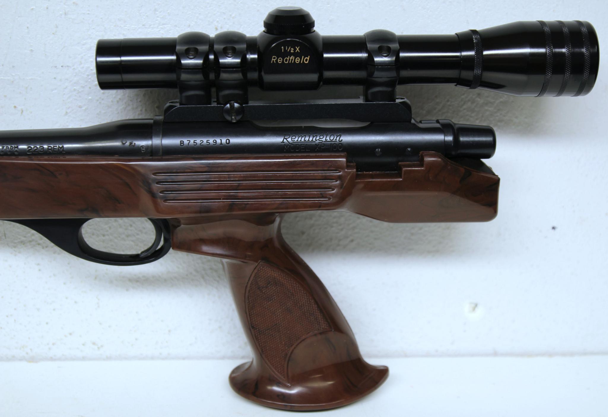 Remington Model XP-100 .223 Rem. Bolt Action Pistol w/Redfield 1 1/2 X Scope Nylon Handle and Stock