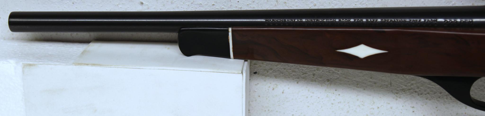 Remington Model XP-100 .223 Rem. Bolt Action Pistol w/Redfield 1 1/2 X Scope Nylon Handle and Stock