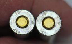 Two U.S. Military .410 Ga. 3" Slug Metallic Shotshells Dated 1970...