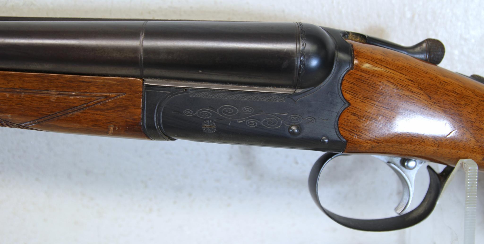 Ithaca Model 100 12 Ga. Side by Side Shotgun... 28" Solid Rib Barrels... 2 3/4" Chamber... Missing B