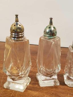 3 Salt and Pepper Shakers and 2 Candle Holders
