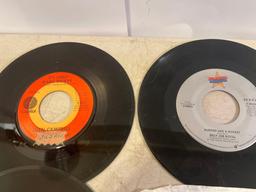 Eleven 45 rpm Records