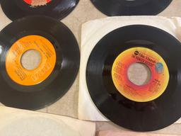 Eleven 45 rpm Records