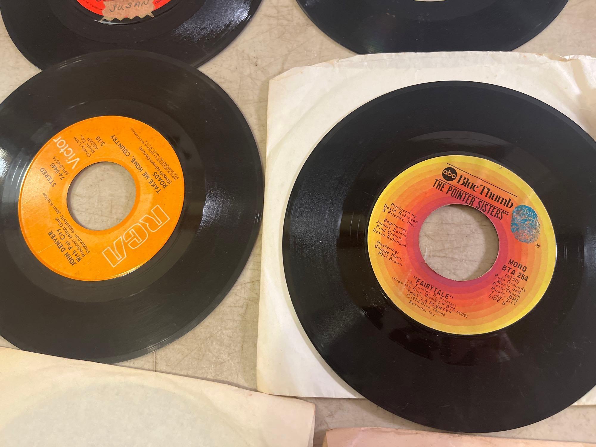 Eleven 45 rpm Records