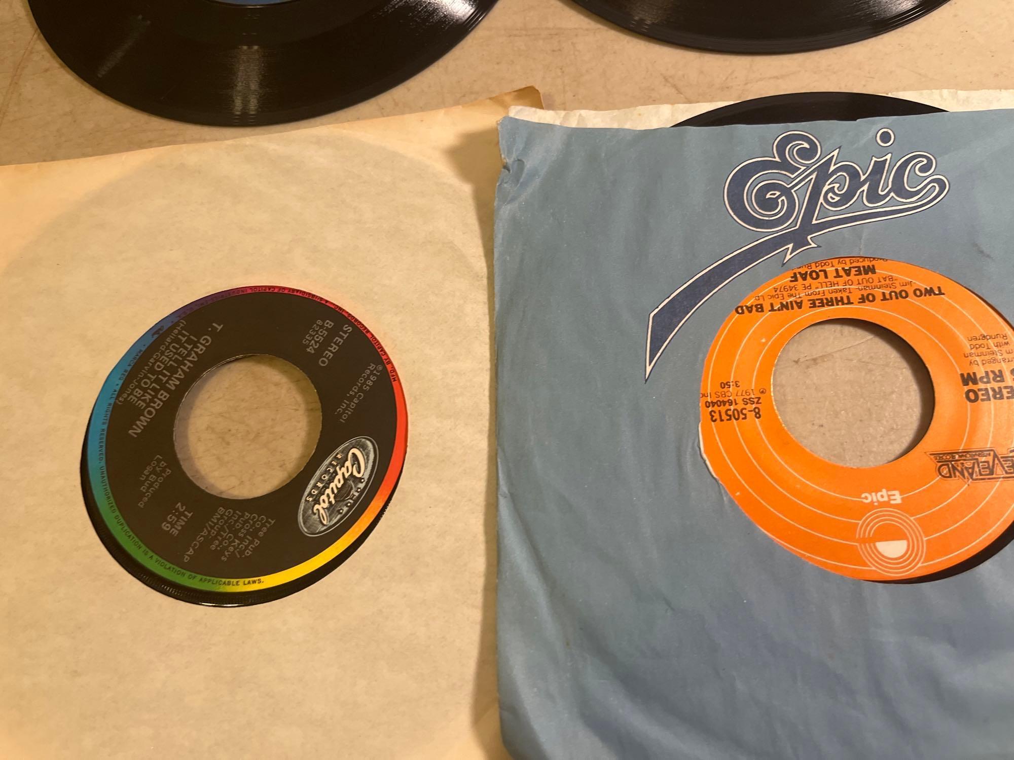 Eleven 45 rpm Records
