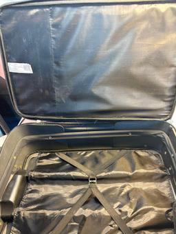 Black Protege Medium Size Luggage Bag On Wheels With Handle