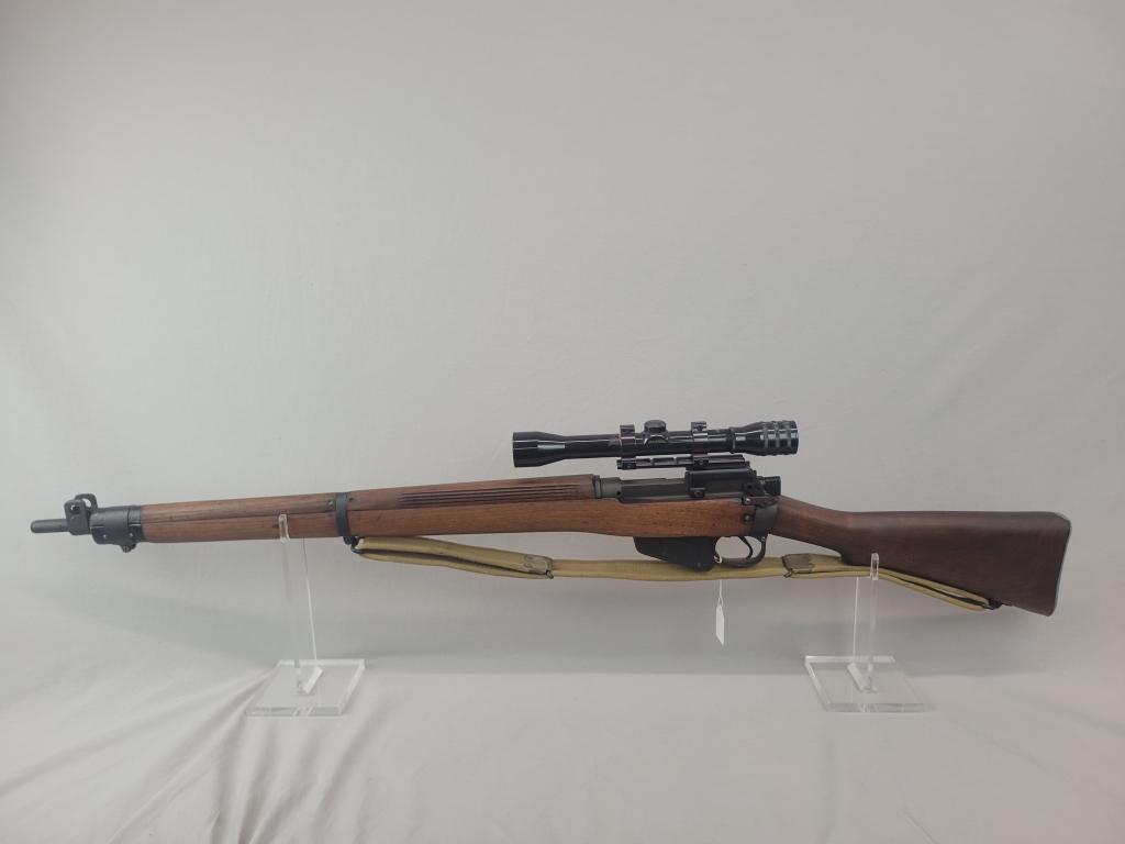 Enfield Rifle Enfield rifle, unknown manufacturer, chambered in .303. Wooden stock and blued barrel