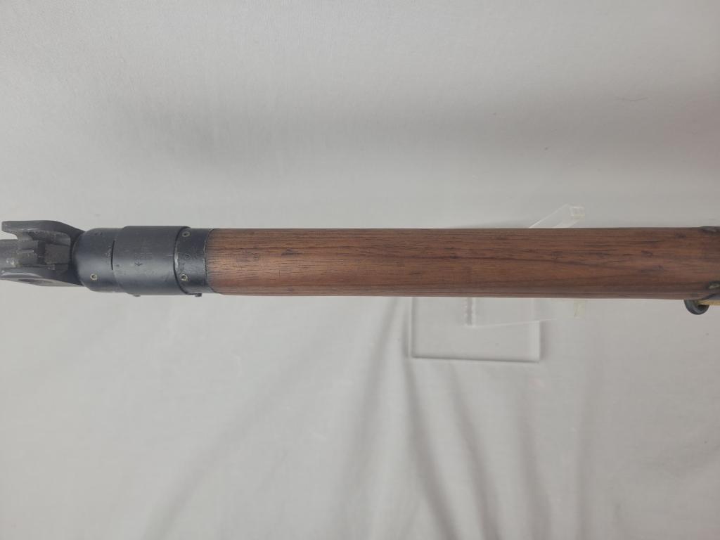Enfield Rifle Enfield rifle, unknown manufacturer, chambered in .303. Wooden stock and blued barrel