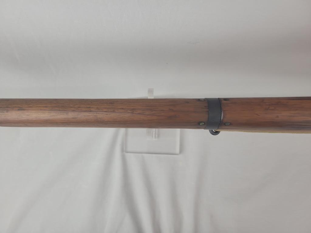 Enfield Rifle Enfield rifle, unknown manufacturer, chambered in .303. Wooden stock and blued barrel