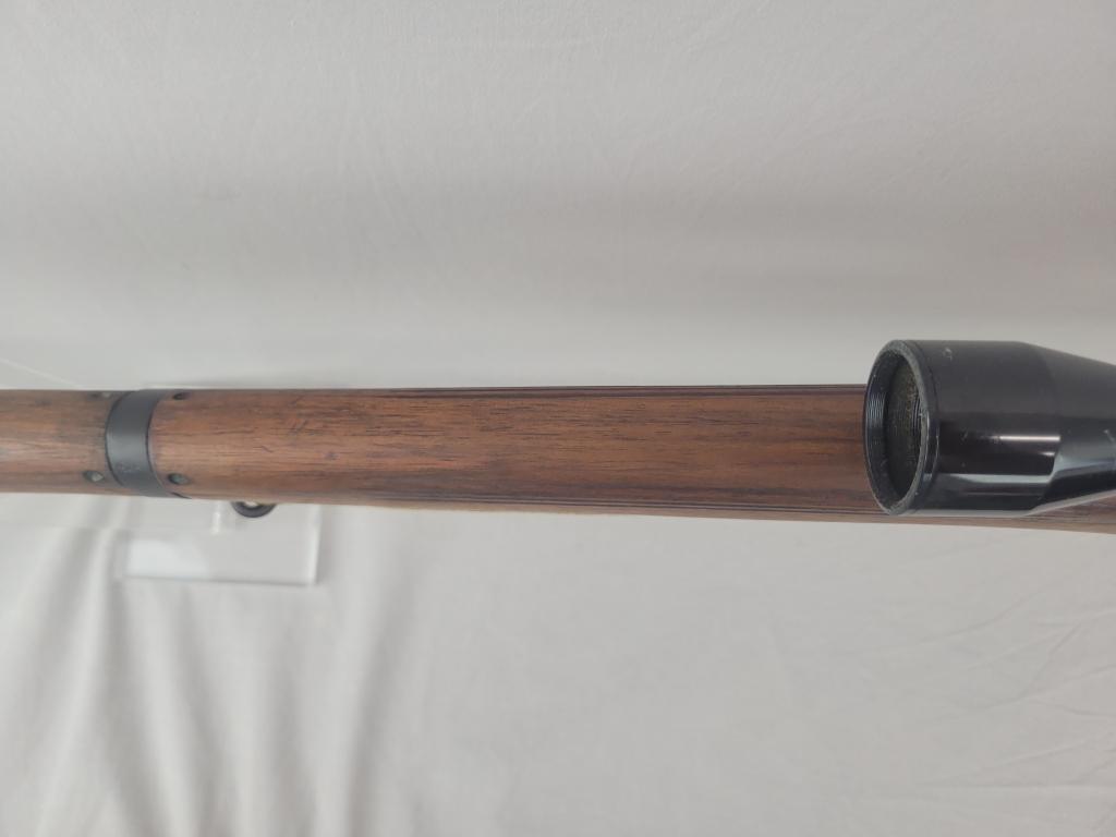 Enfield Rifle Enfield rifle, unknown manufacturer, chambered in .303. Wooden stock and blued barrel