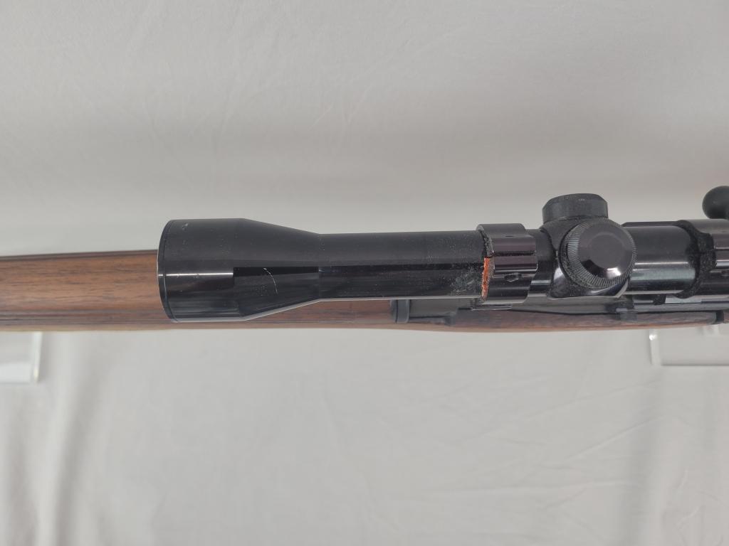 Enfield Rifle Enfield rifle, unknown manufacturer, chambered in .303. Wooden stock and blued barrel