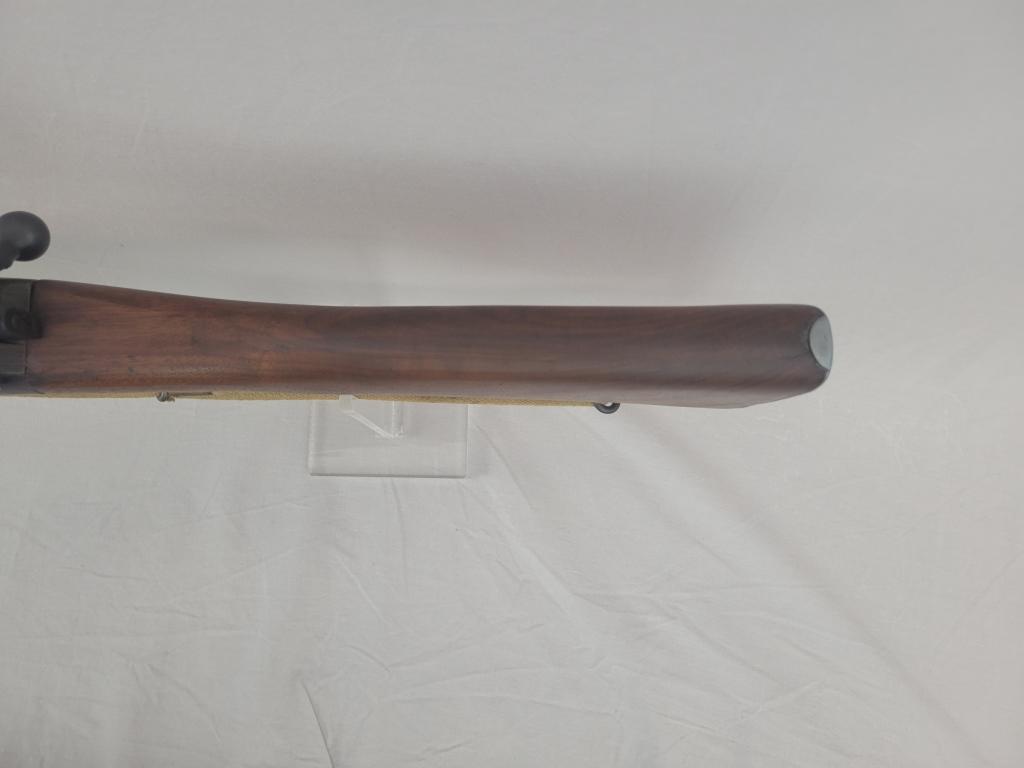 Enfield Rifle Enfield rifle, unknown manufacturer, chambered in .303. Wooden stock and blued barrel
