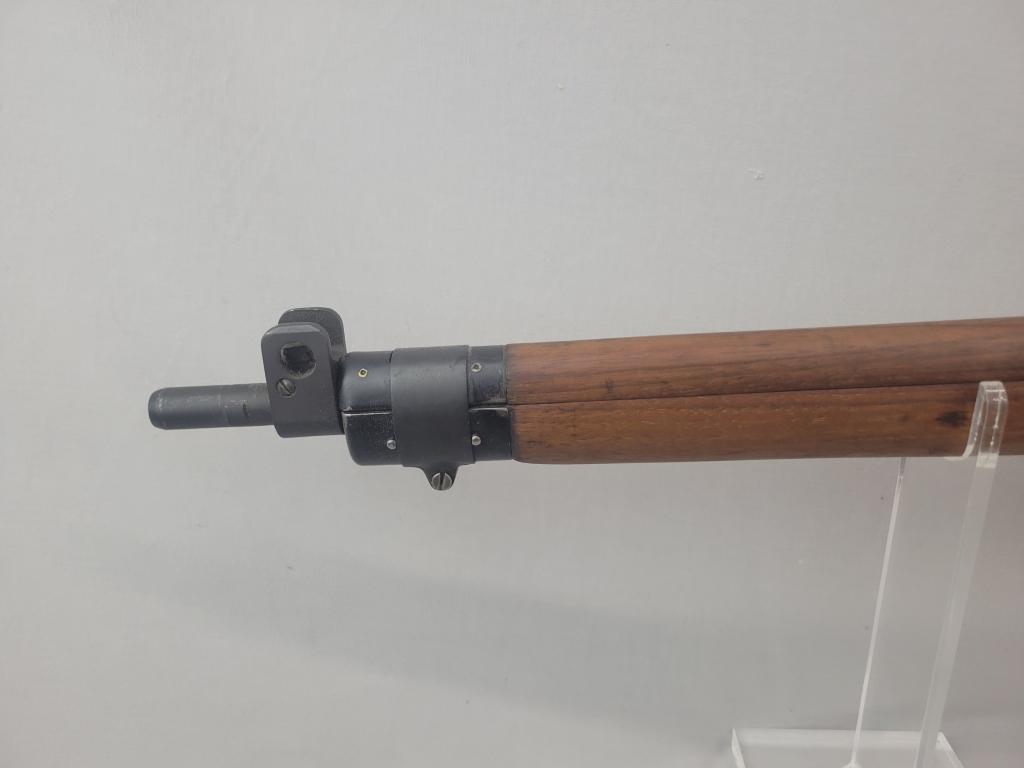 Enfield Rifle Enfield rifle, unknown manufacturer, chambered in .303. Wooden stock and blued barrel
