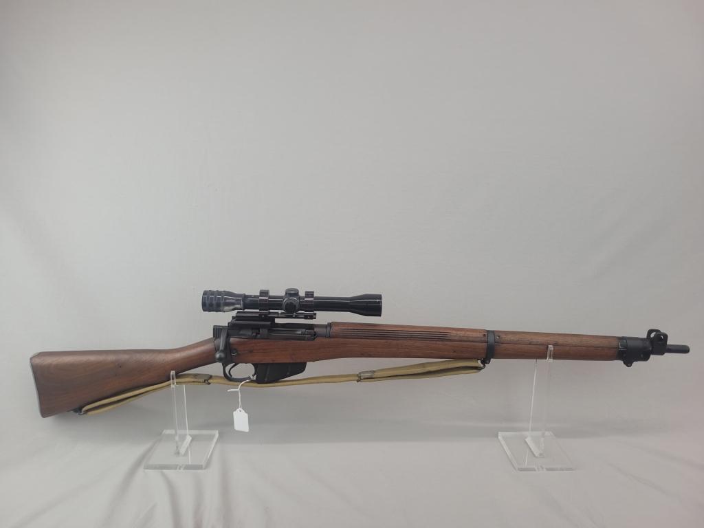 Enfield Rifle Enfield rifle, unknown manufacturer, chambered in .303. Wooden stock and blued barrel