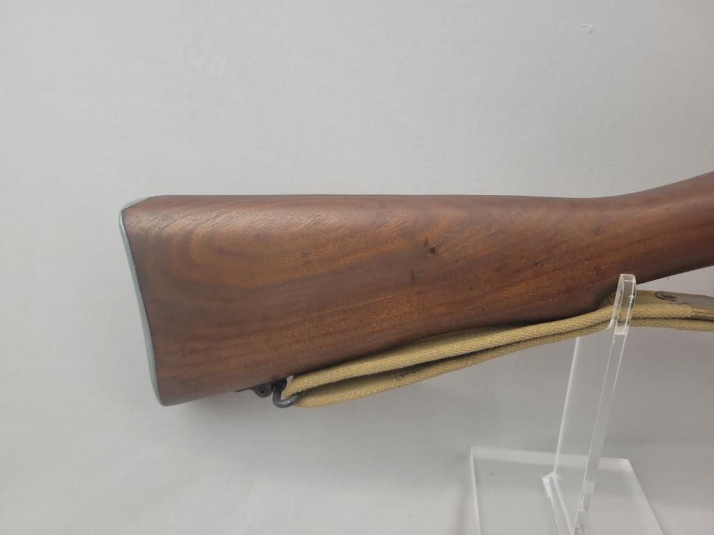 Enfield Rifle Enfield rifle, unknown manufacturer, chambered in .303. Wooden stock and blued barrel