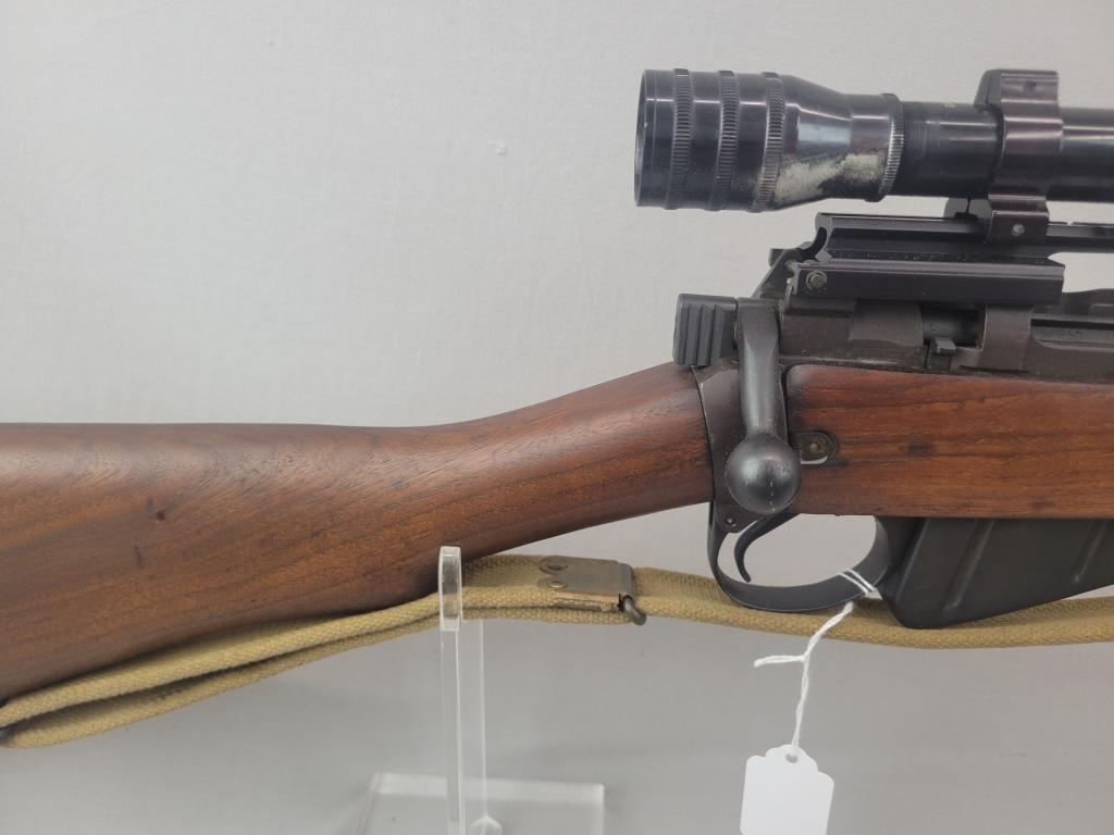 Enfield Rifle Enfield rifle, unknown manufacturer, chambered in .303. Wooden stock and blued barrel